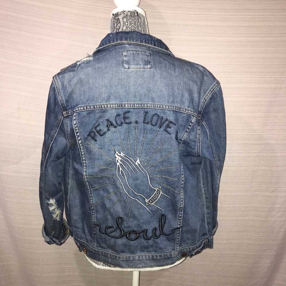 Distressed denim jacket